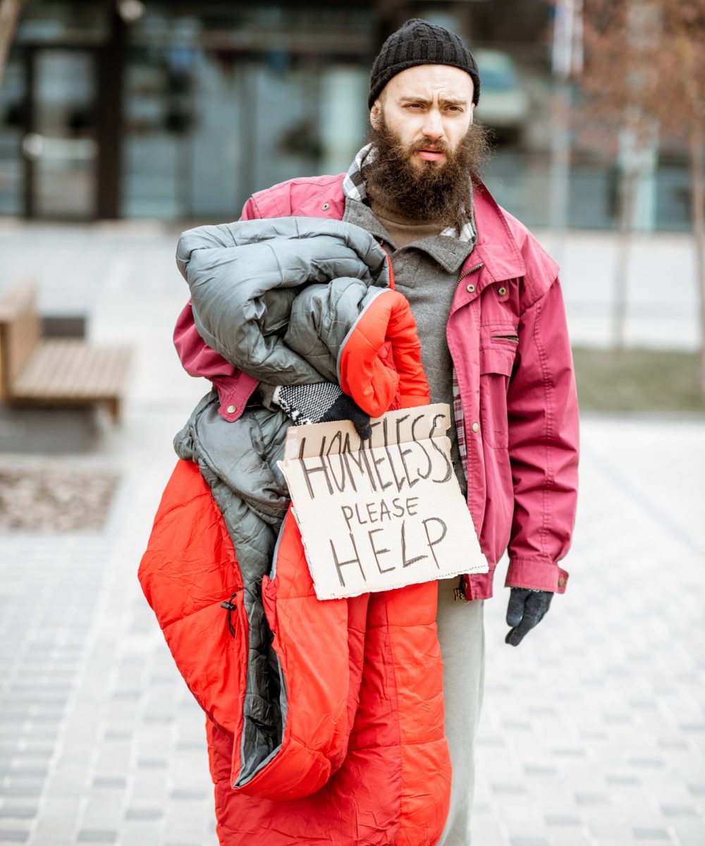 homeless-beggar-near-the-business-center.jpg